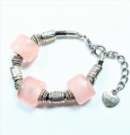 Bransoletka kwarc różowy  na czarnym rzemieniu