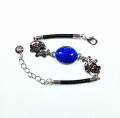 Bransoletka z lapis lazuli na czarnym rzemieniu 17 cm + 4 cm przedłużka z łańcuszka