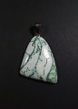 Biały agat mszysty na posrebrzanej zawieszce
Rozmiar kamienia 3,3 cm x 4 cm