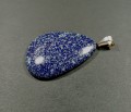 Wisiorek z lapis lazuli z posrebrzaną zawieszką. 
Rozmiar kamienia 51 mm x 39 mm