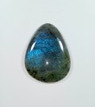 Labradoryt 
Rozmiar kamienia 43 mm x 54 mm 
Pływające błękity