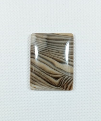 Krzemień pasiasty, naturalny kamień ręcznie formowany, szlif kaboszonowy 
Rozmiar kamienia 37 mm x 28 mm
